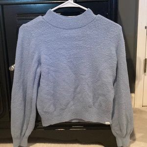 A blue abicrombie sweater it is new and in good condition a little statickey